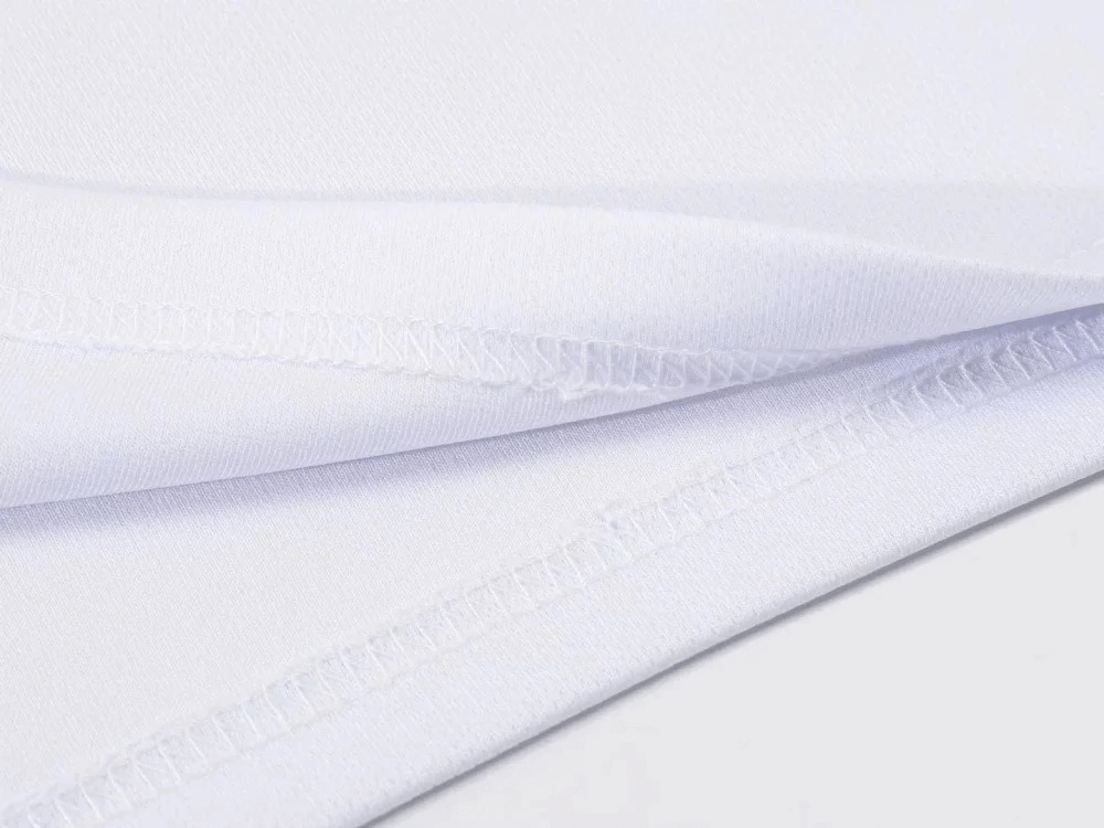 Close-up of breathable polyester fabric from SF2017 Athletic O-Neck Sportswear Set, highlighting stitch detail for durability in sportswear.