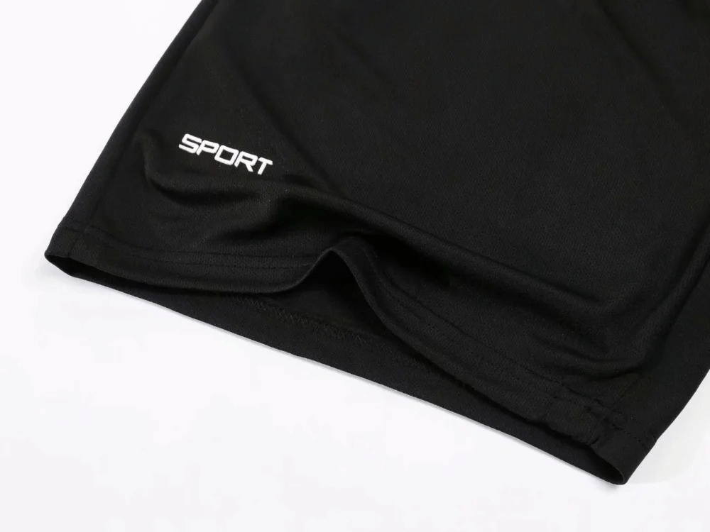 Close-up of black athletic shorts from Athletic O-Neck Sportswear Set for Men - SF2017, featuring durable, breathable polyester fabric.