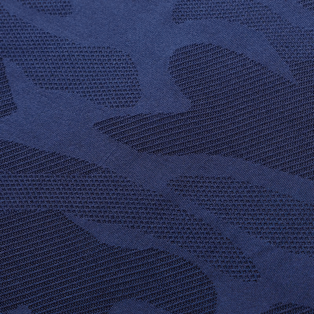 Close-up of navy blue camouflage pattern on lightweight quick-dry athletic fabric, ideal for gym and outdoor activities.