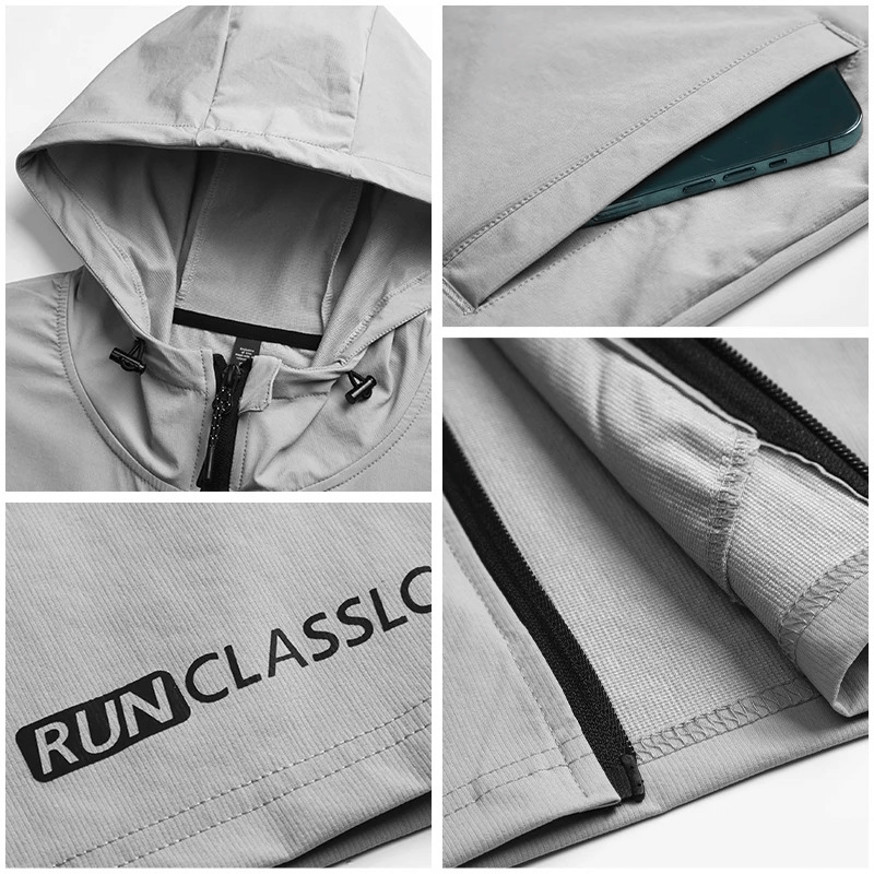 Gray men's athletic windbreaker with zip-up design, hood, and pockets. Features brand logo 'RUNCLASSLO' on durable polyester fabric.