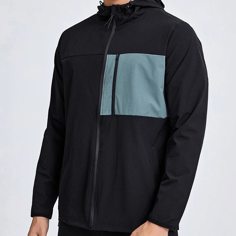 Black athletic windbreaker with zip for men - SF2010, featuring a color-block design and a hood. Ideal for outdoor activities.