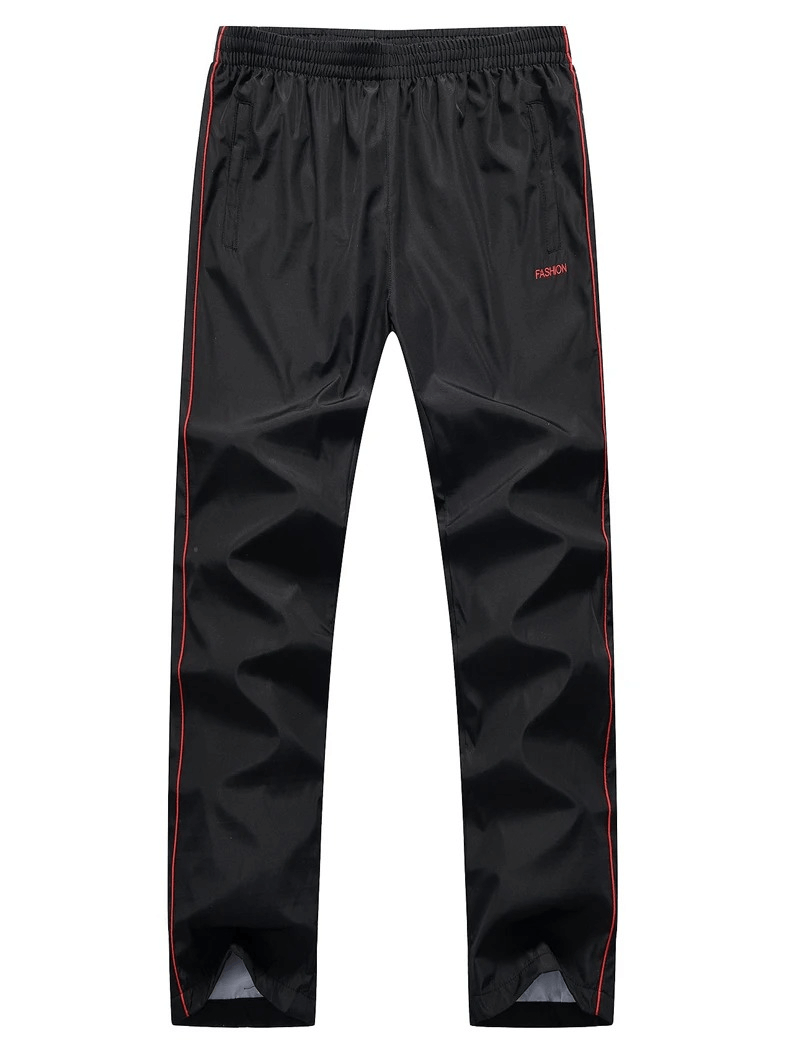 Stylish men's athletic pants with elastic waist, black with red accents, perfect for outdoor sports and casual wear.