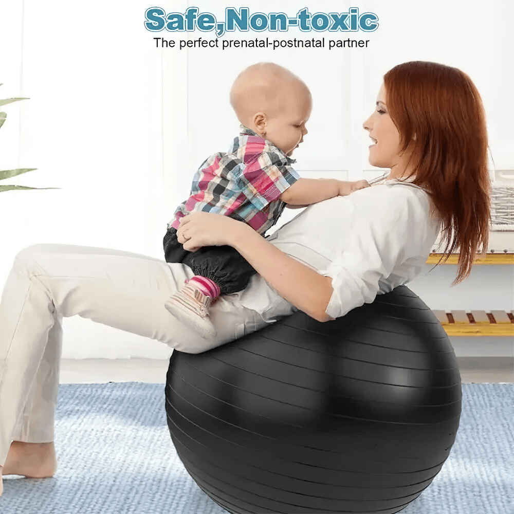 Woman with baby on black balance ball for home fitness, perfect for prenatal exercises and safe stability training.