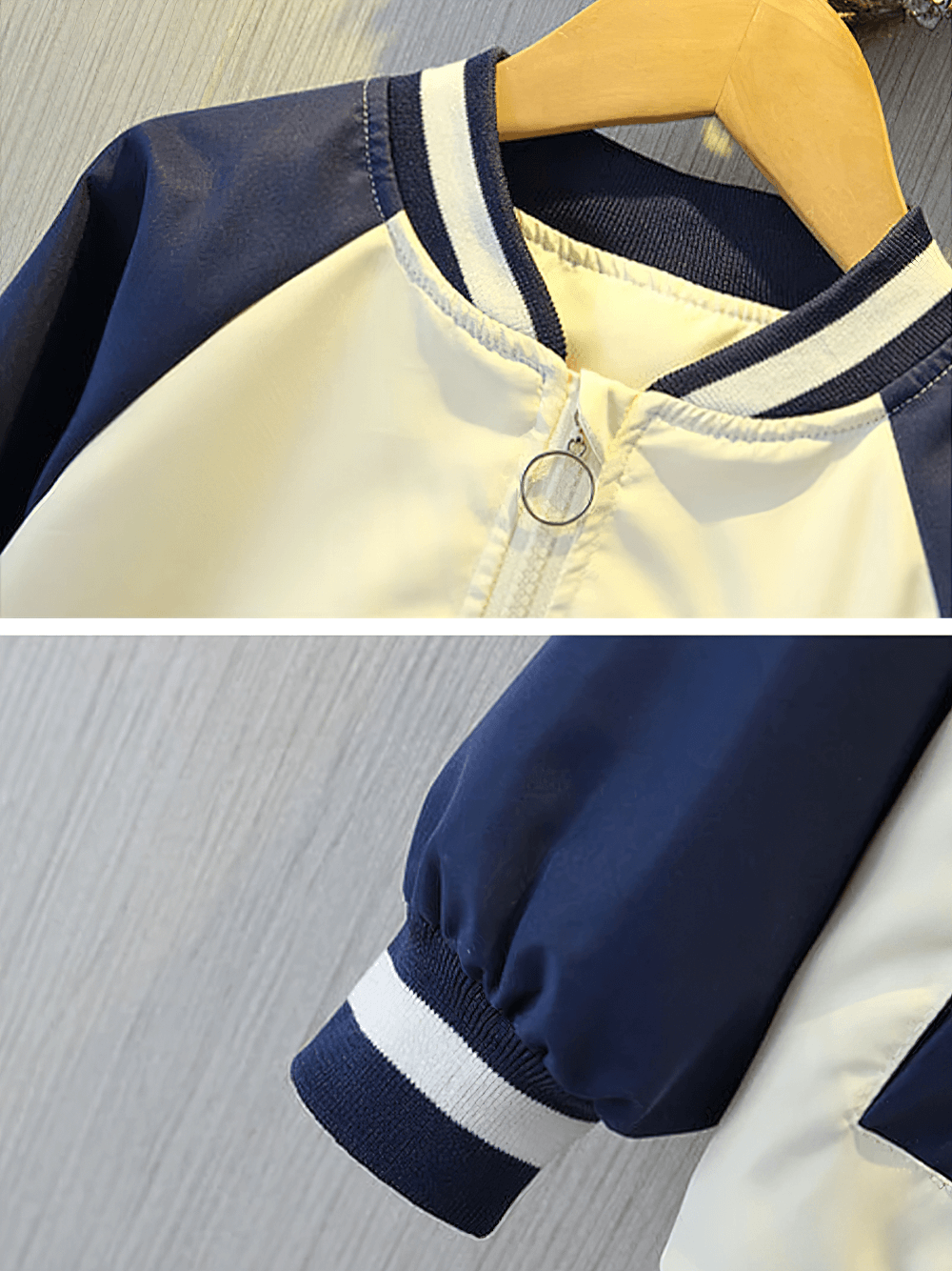 Close-up of a kid's baseball jacket with letter print, contrasting sleeves, zipper detail, and ribbed cuffs, perfect for autumn outings.