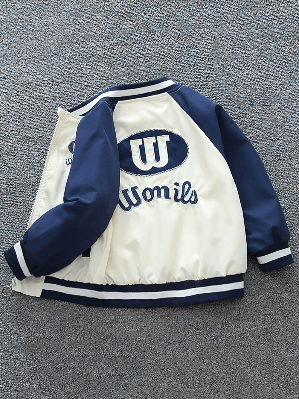 Fashion kids baseball jacket with letter print and zipper detail, featuring navy and white contrast sleeves for a sporty autumn look.