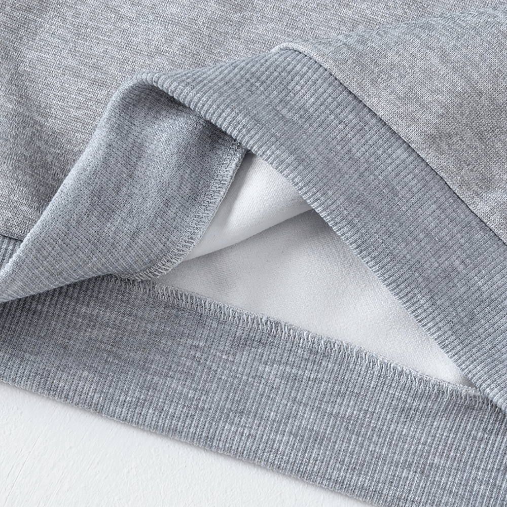 Close-up of grey Basic Crew Neck Solid Color Sweatshirt - SF3539, showing soft fleece fabric and ribbed hem detail.