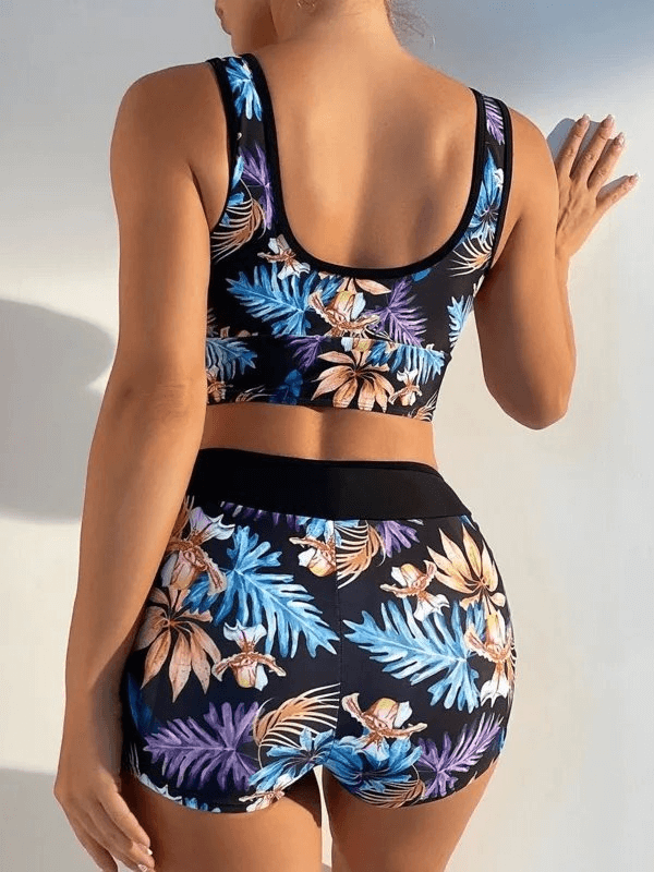 Back view of Beach Women's Two-piece Swimsuit with Floral Print, featuring vibrant tropical patterns. Ideal for swimming.