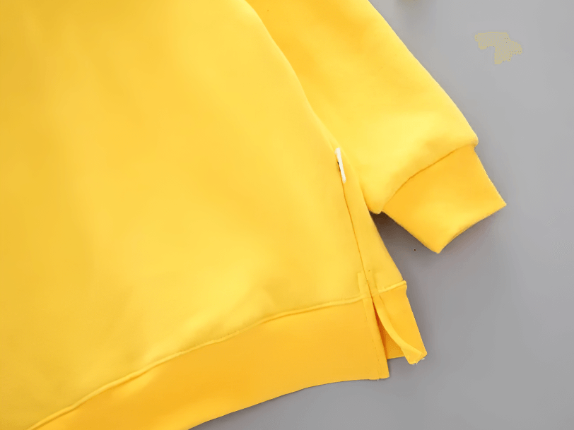 Close-up of Bear Ears Hoodie with Zip and Side Slits - SF3655, showcasing the side slit in a vibrant yellow color.