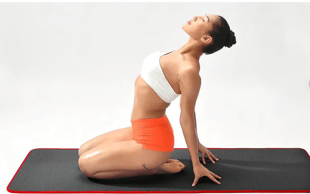 Woman practicing yoga on black and red non-slip yoga mat, showcasing durability and eco-friendly features for fitness and exercise.