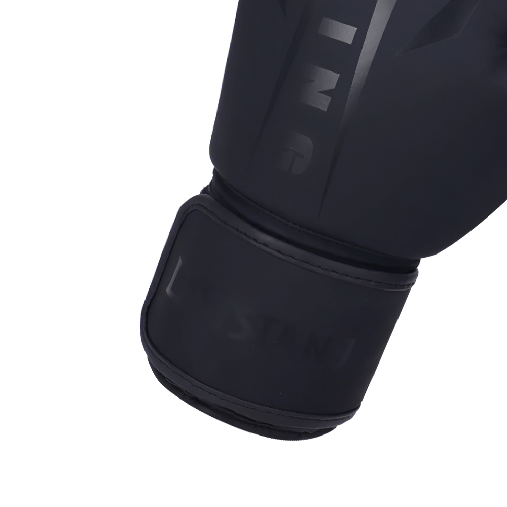 Matte black boxing glove with hook and loop strap for training, made of durable PU leather, perfect for sparring and combat practice.