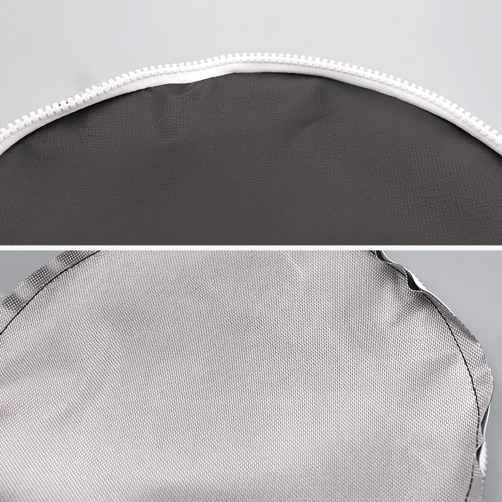 Close-up of boxing punching bag material and stitching, shows durable synthetic leather PVC and reinforced seams for intense training use.