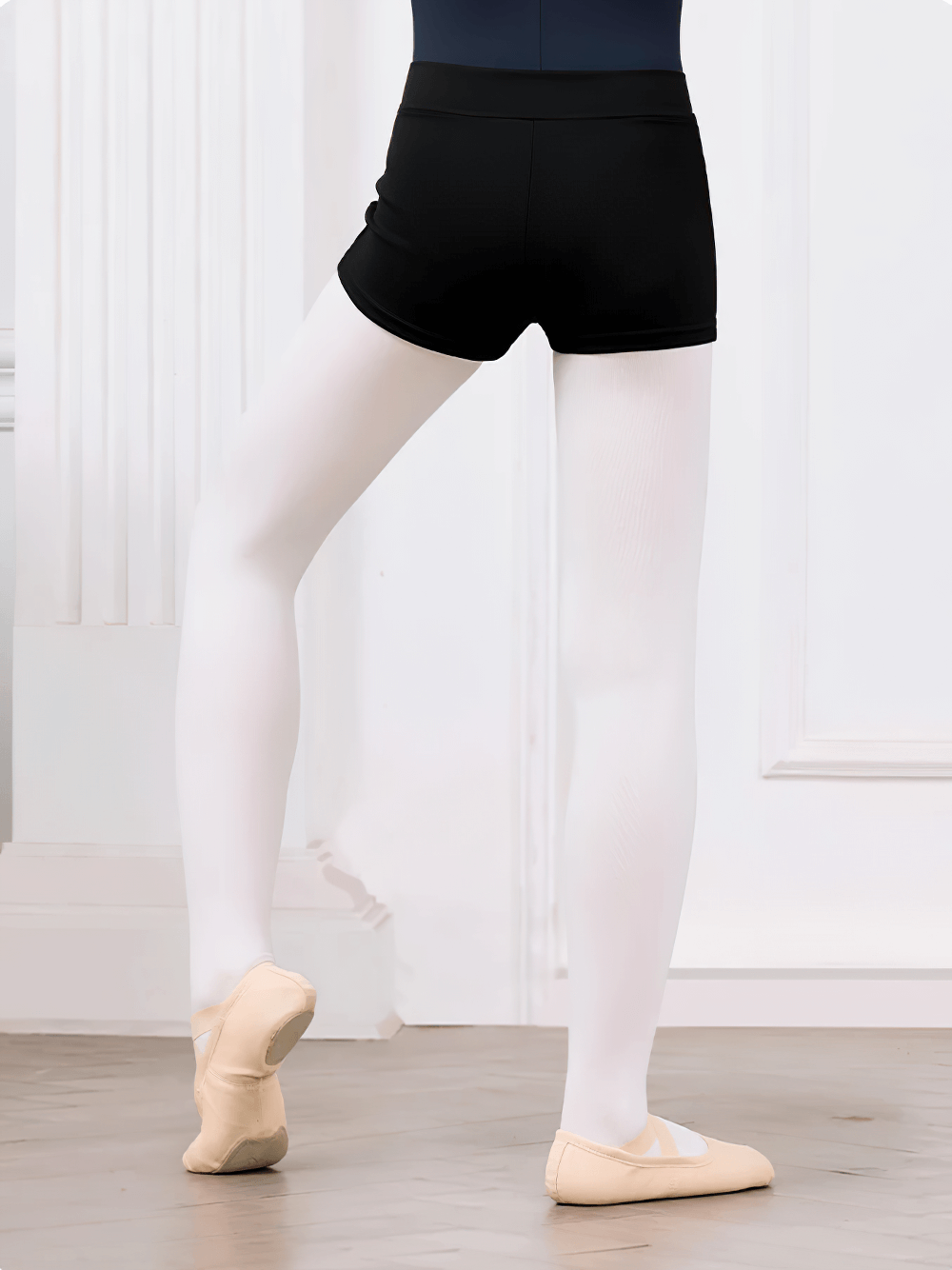 Black Kids Shorts with High Elastic Waistband - SF3748 for gymnastics and yoga, showing back view on child in a dance pose.