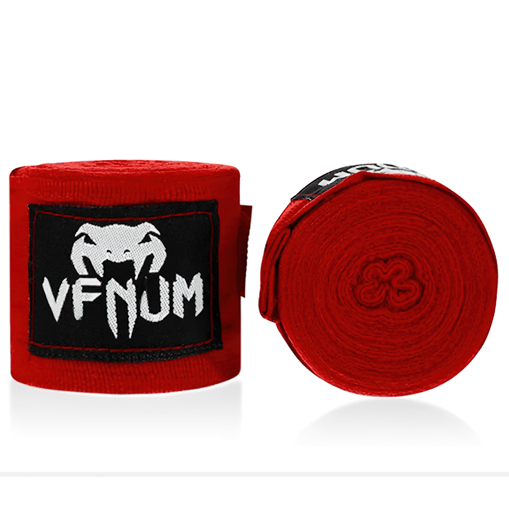 Red boxing hand wraps with hook-and-loop closure for MMA and training, featuring a bold logo on the elastic cotton material.