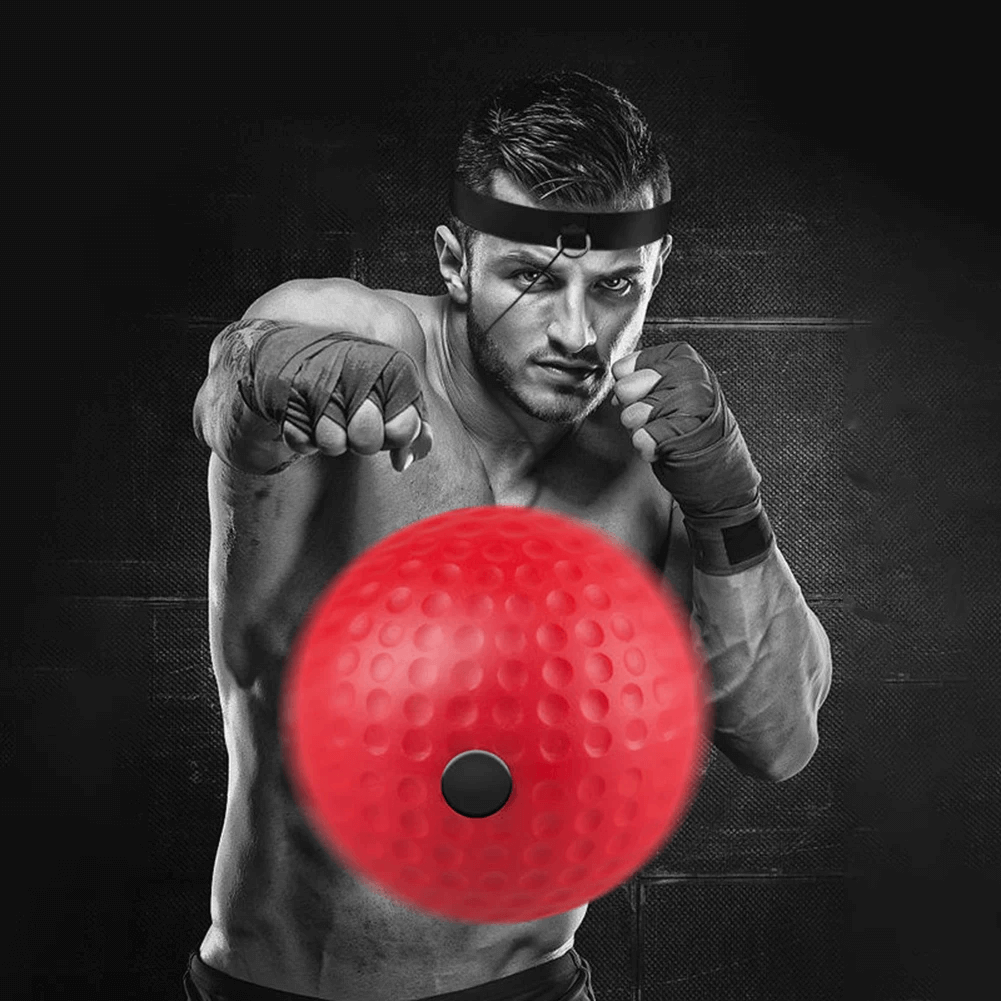 Man training with a red boxing reflex ball and headband set for MMA and speed enhancement.