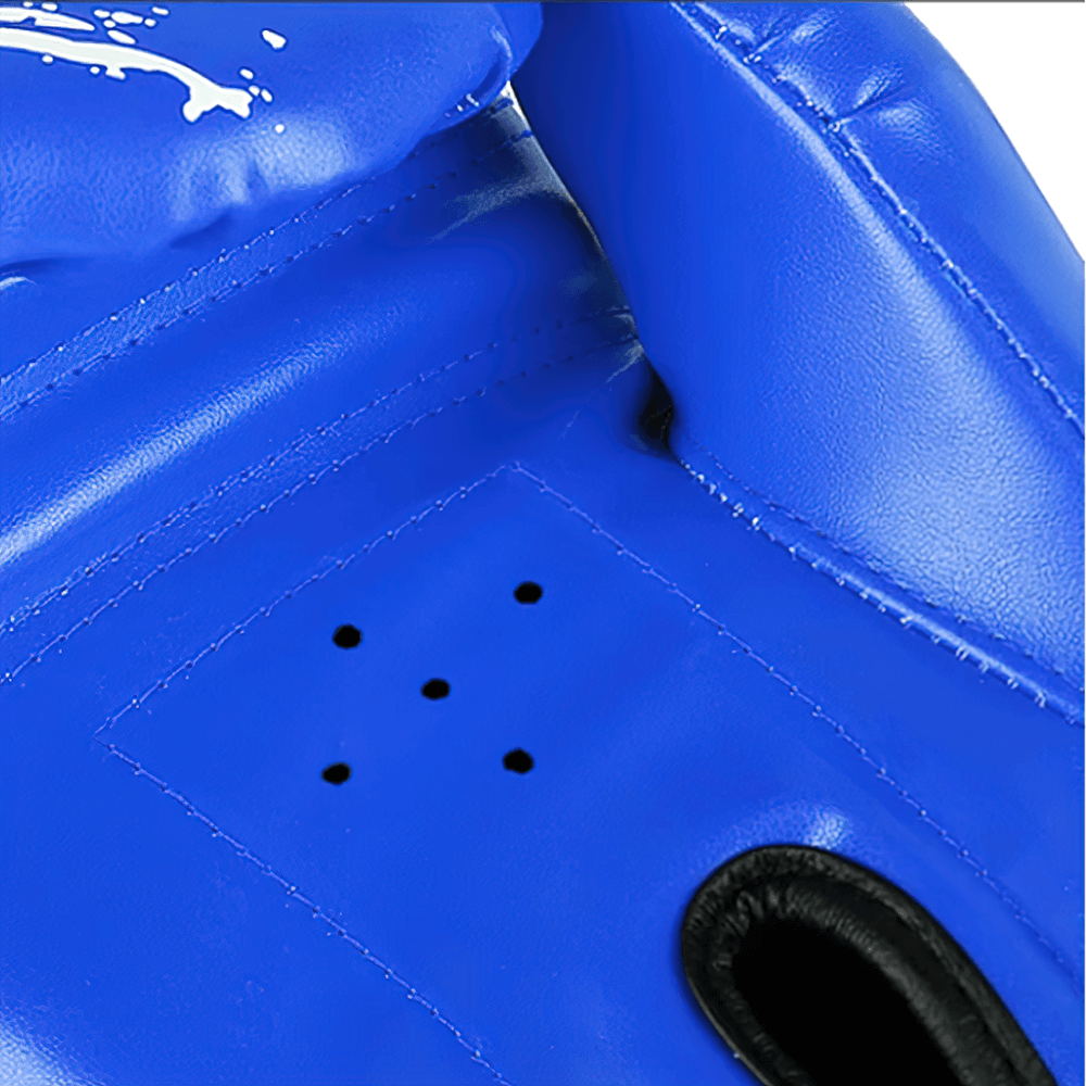 Close-up of blue boxing glove with splash paint design, showing ventilation holes and reinforced stitching for sparring and fitness.
