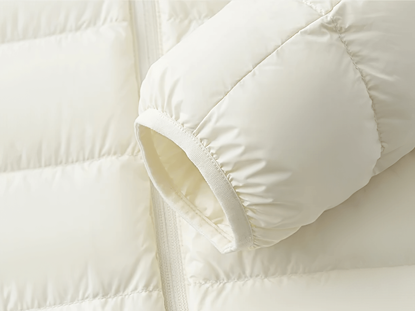 Close-up of white sleeve on Boys and Girls Puffer Down Jacket for Cold Weather - SF3691, showcasing its insulated fabric.