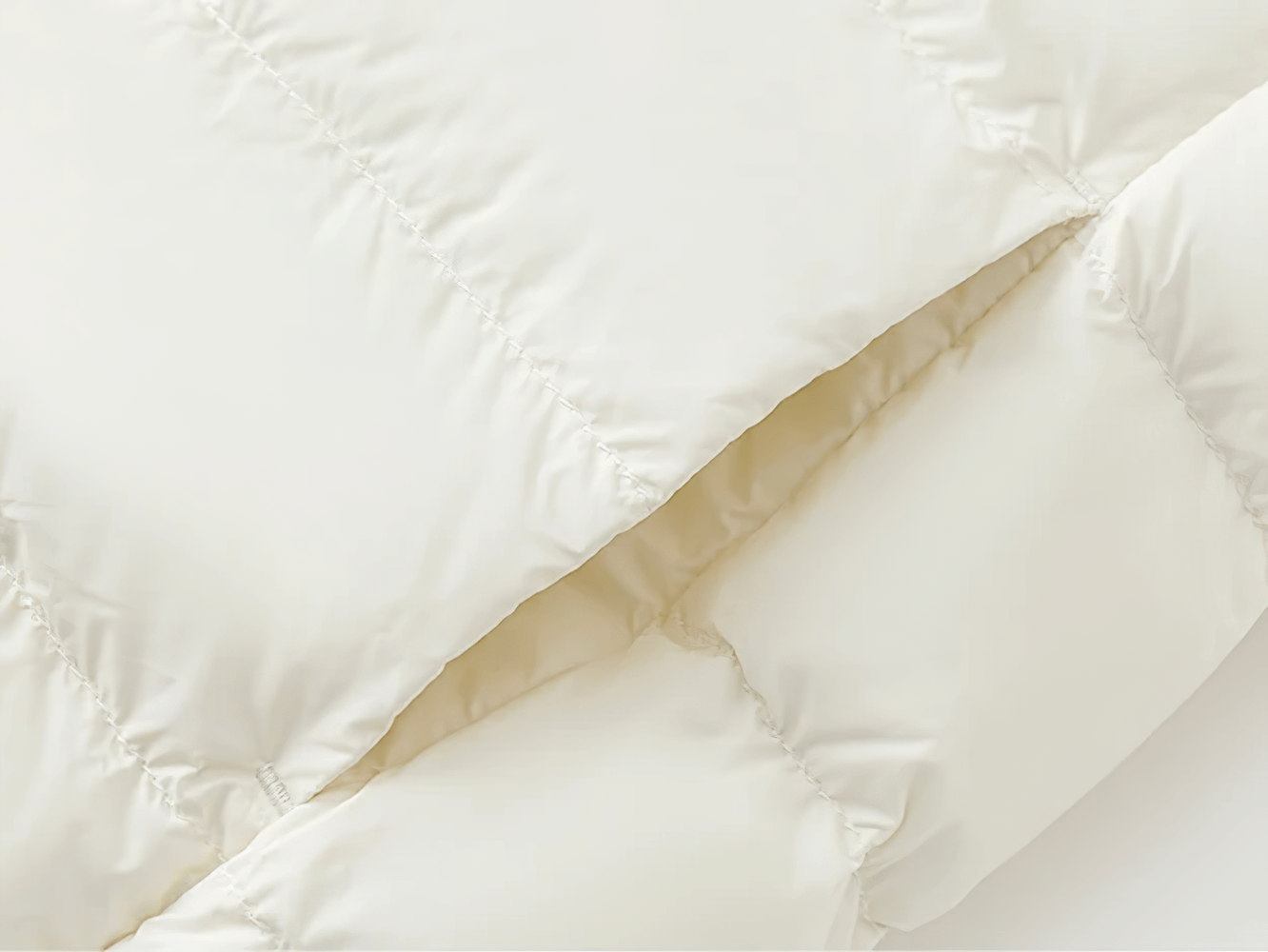 Close-up of Boys and Girls Puffer Down Jacket for Cold Weather - SF3691 in cream color, showcasing the quilted design and stitching.