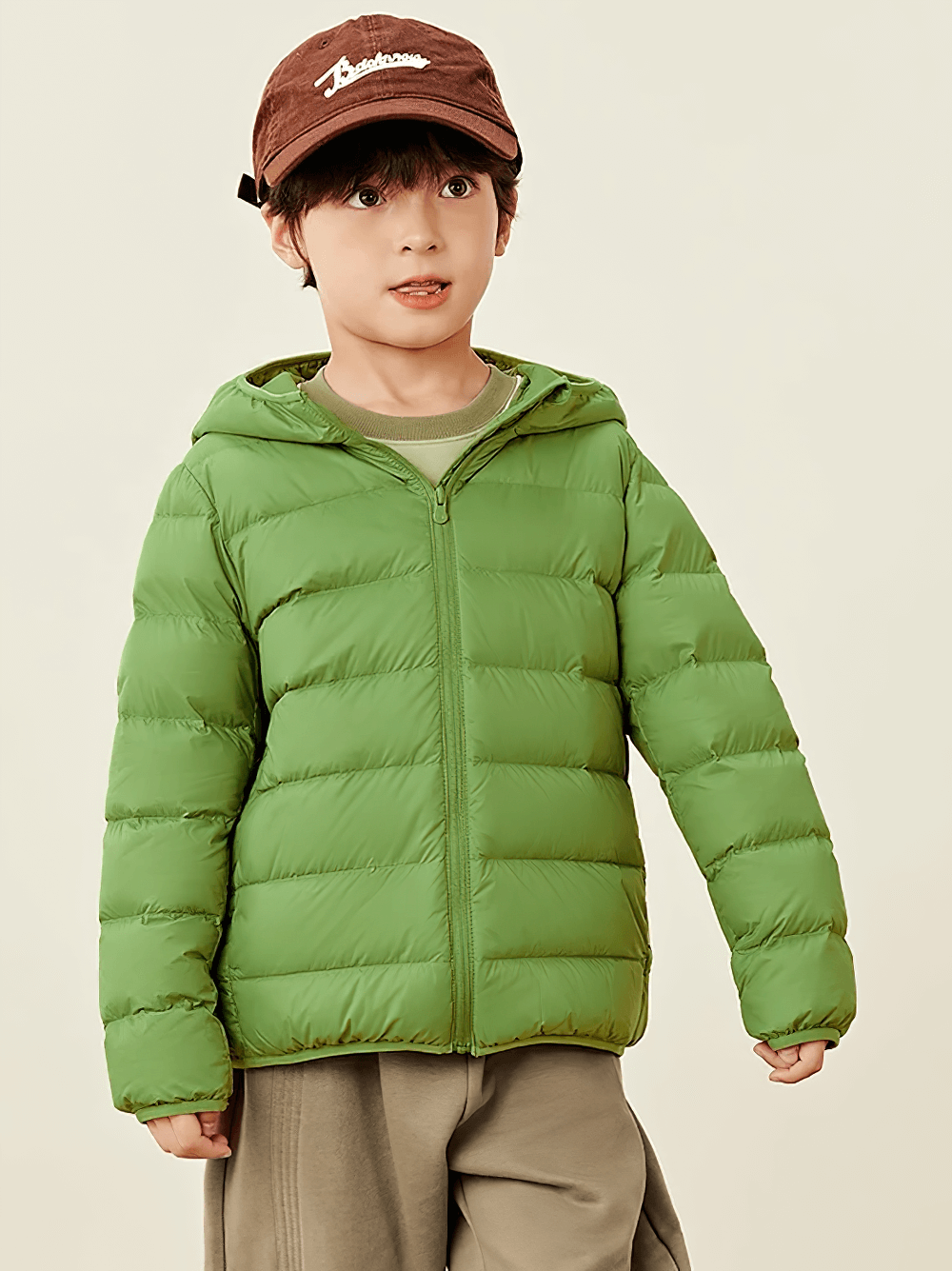 Boys and Girls Puffer Down Jacket for Cold Weather - SF3691 in green worn by a young model, ideal for chilly days.