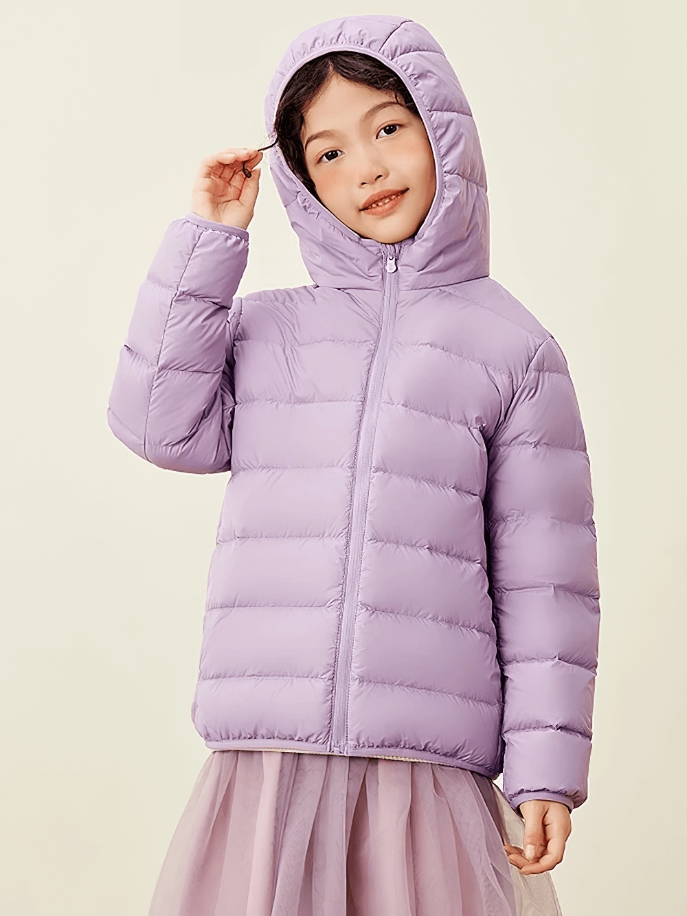 Child wearing a lavender Boys and Girls Puffer Down Jacket for Cold Weather - SF3691 with a hood and a smile.
