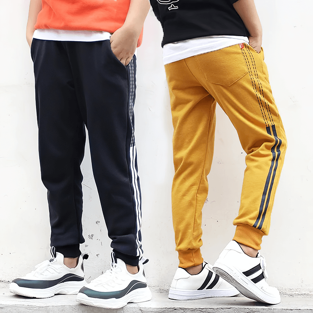 Two boys wearing Boys Athletic Jogger Sweatpants with Pockets - SF3611 in navy and mustard, showcasing front and back views.