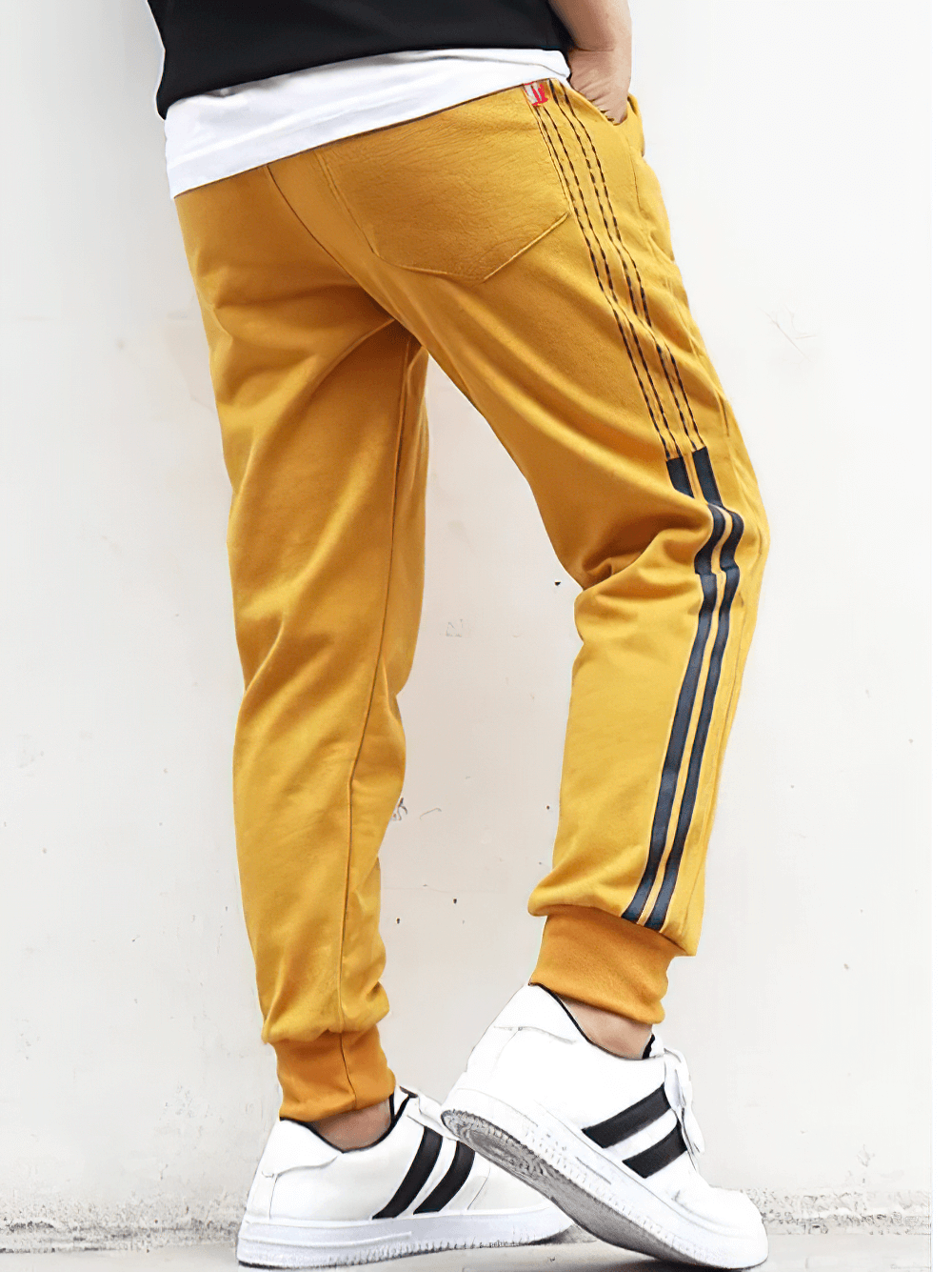 Boys Athletic Jogger Sweatpants with Pockets - SF3611 in yellow, featuring a stripe design, shown from the back with casual shoes.
