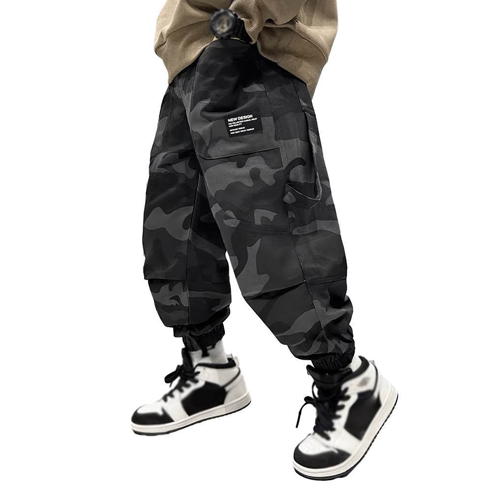 Boy wearing Boys Camouflage Cargo Pants with Windproof Feature - SF3834, showcasing style and comfort with elastic waistband and pockets.