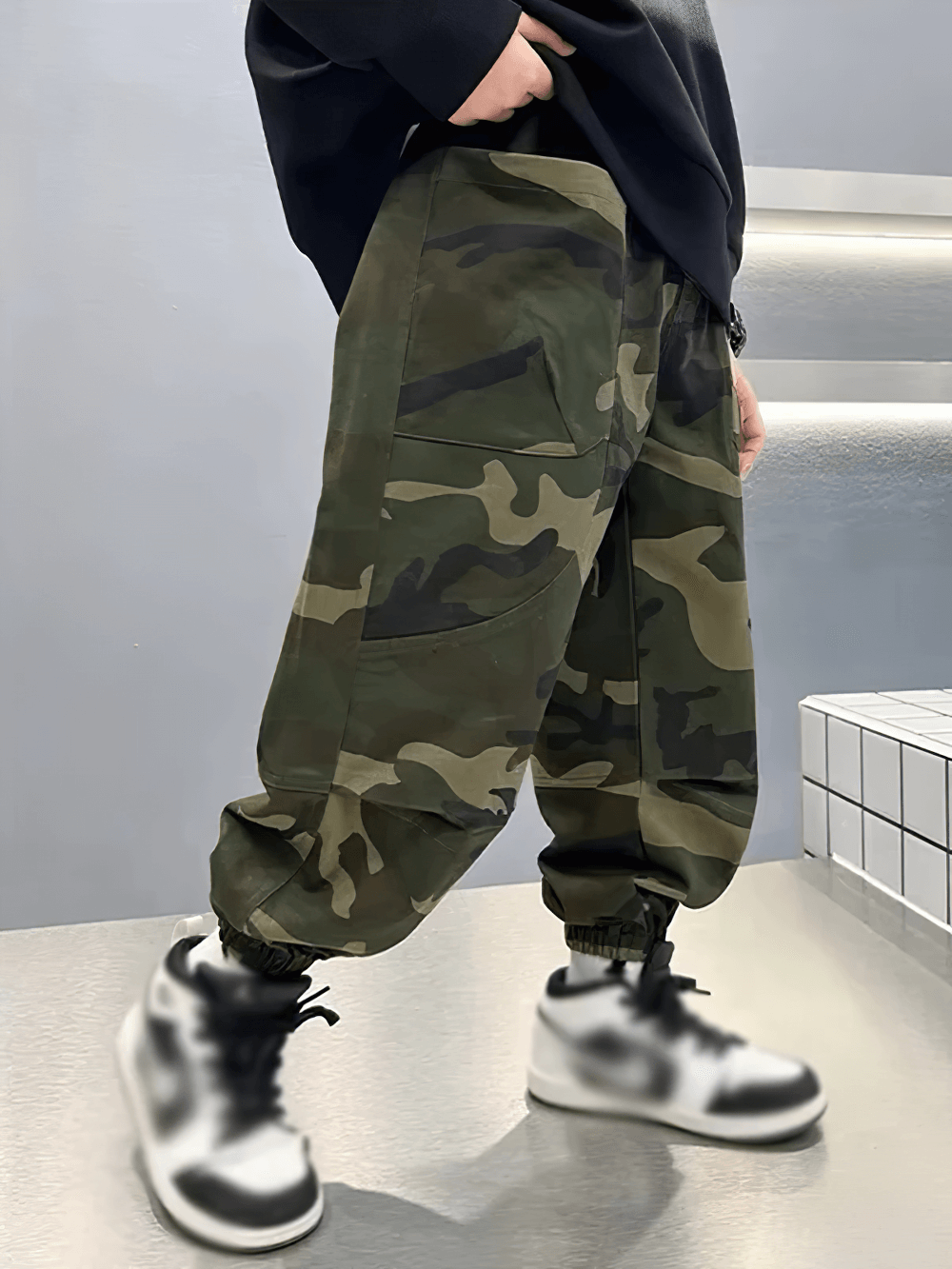 Boys Camouflage Cargo Pants with Windproof Feature - SF3834 shown in a stylish outdoor setting