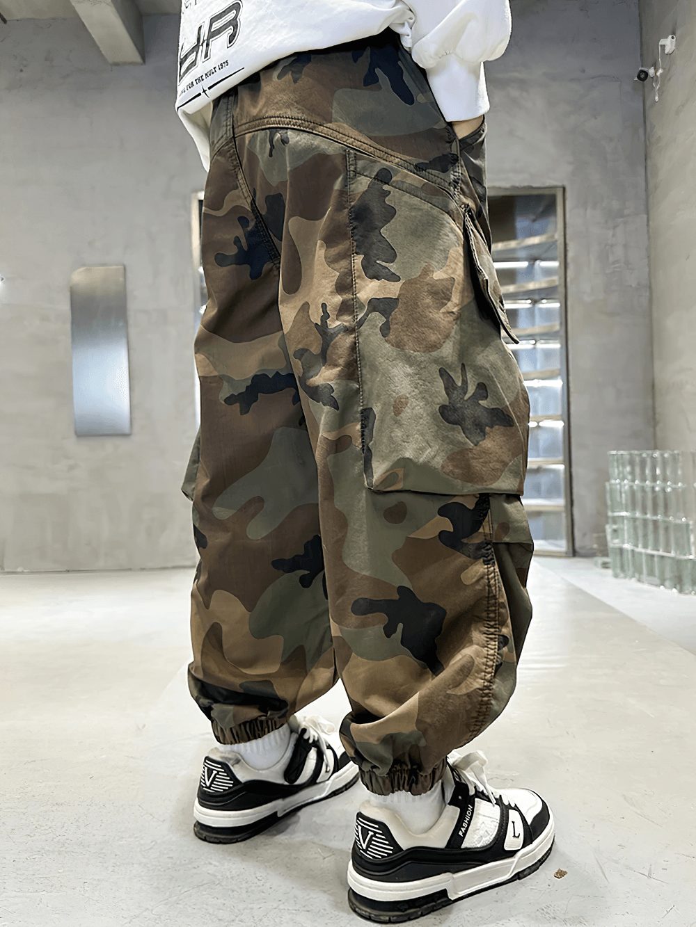 Boys Camouflage Jogger Pants with Elastic Waist - SF3871, sporty design with cuffed hems and cargo pockets in urban environment.