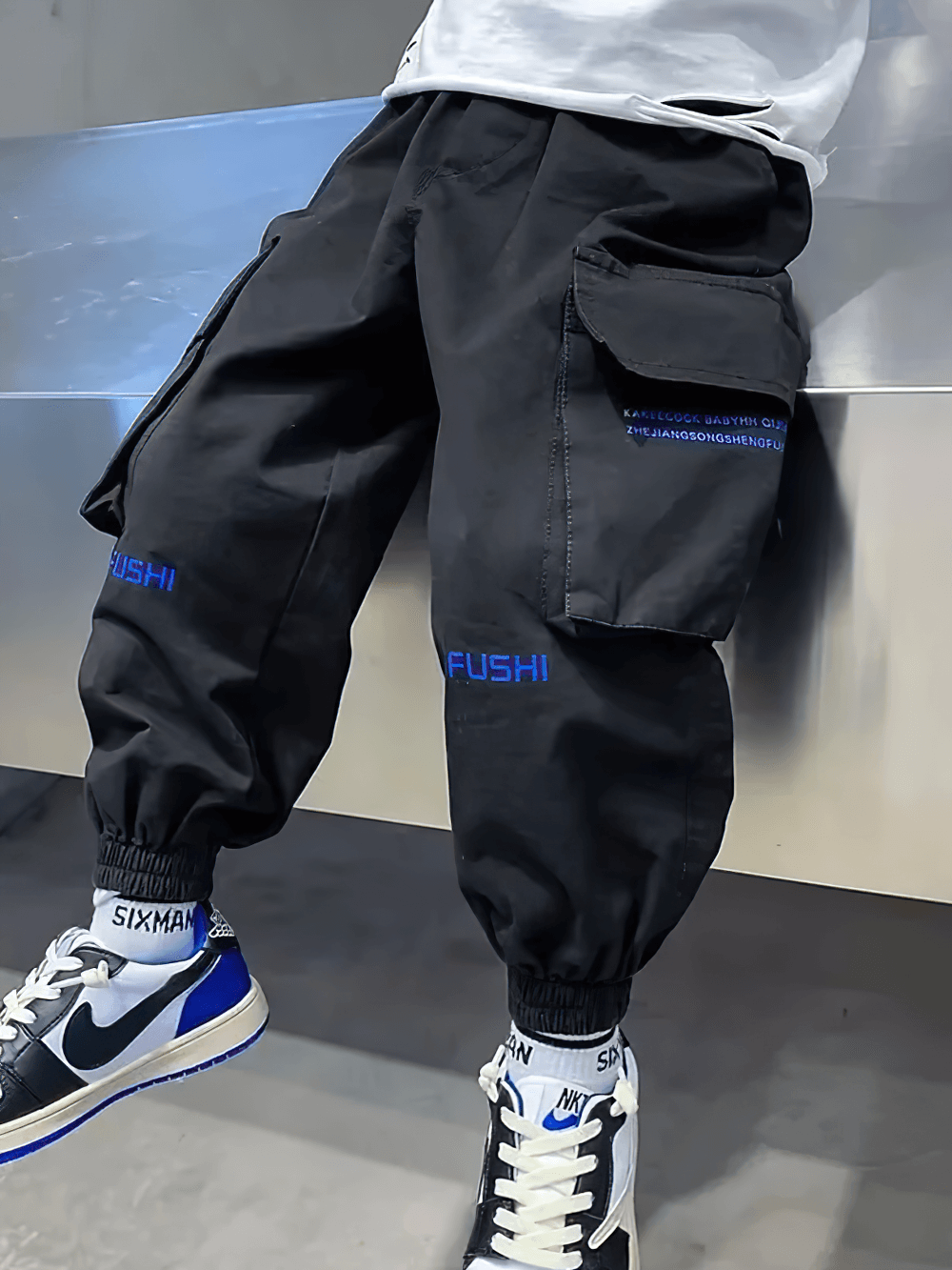 Boys Cargo Jogger Pants with Side Pockets - SF3865 in black, featuring elastic waist and oversized pockets, perfect for active streetwear.