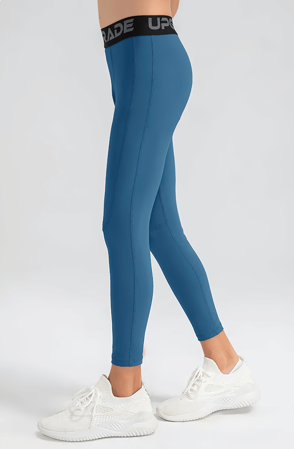 Side view of Boys Compression Sports Leggings for Training - SF3794 in blue, showcasing streamlined fit and elastic waist.