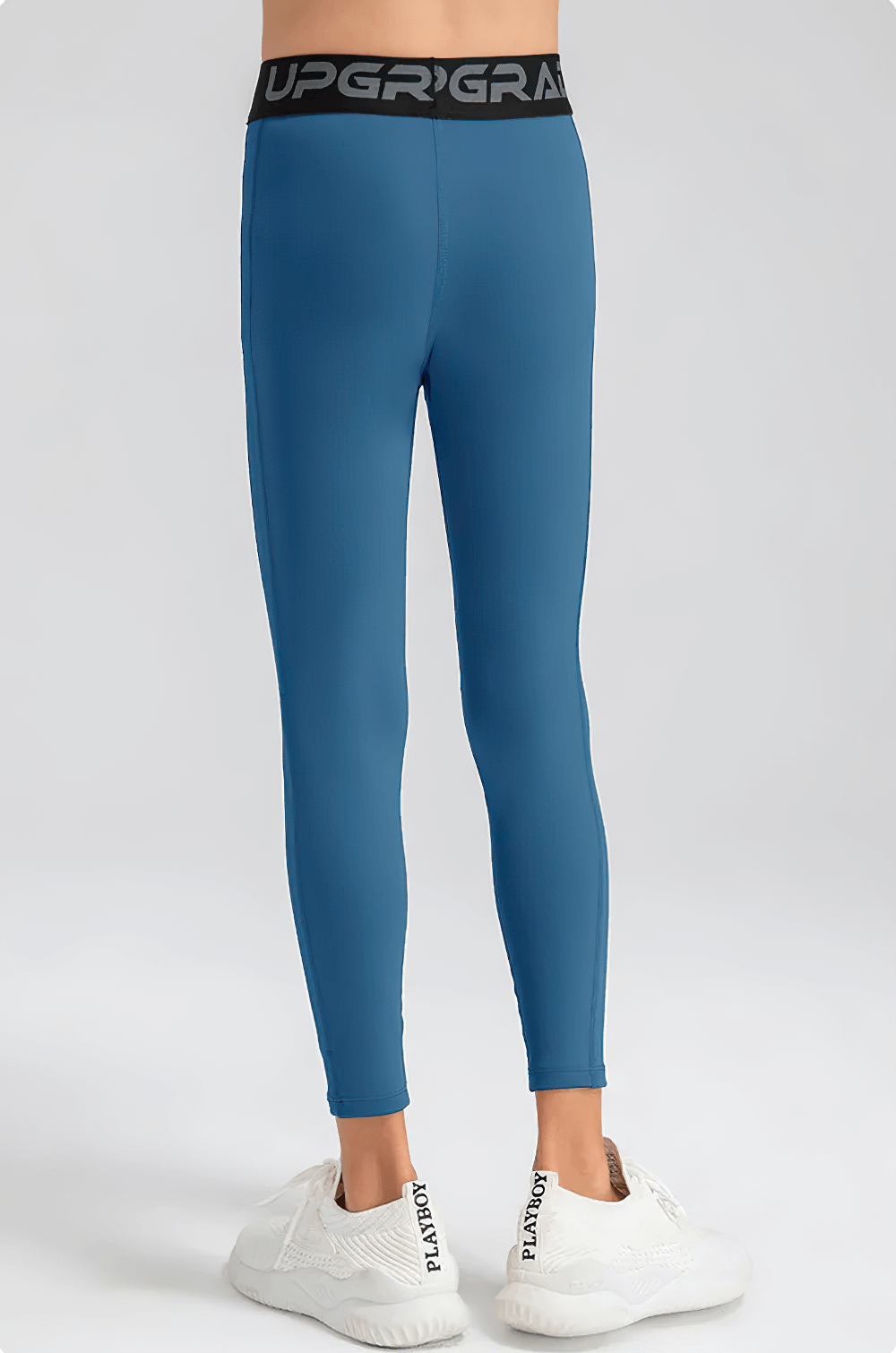 Back view of Boys Compression Sports Leggings for Training - SF3794, showcasing elastic waist and streamlined fit for active sports.