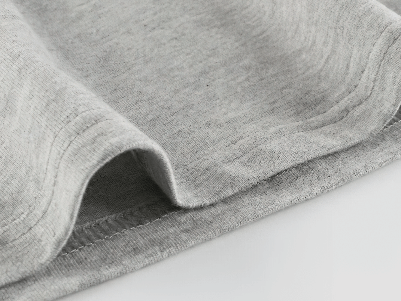 Close-up of grey fabric hem of Boys Cotton Long-Sleeved Top with Letter Print - SF3608 showcasing soft 100% cotton material