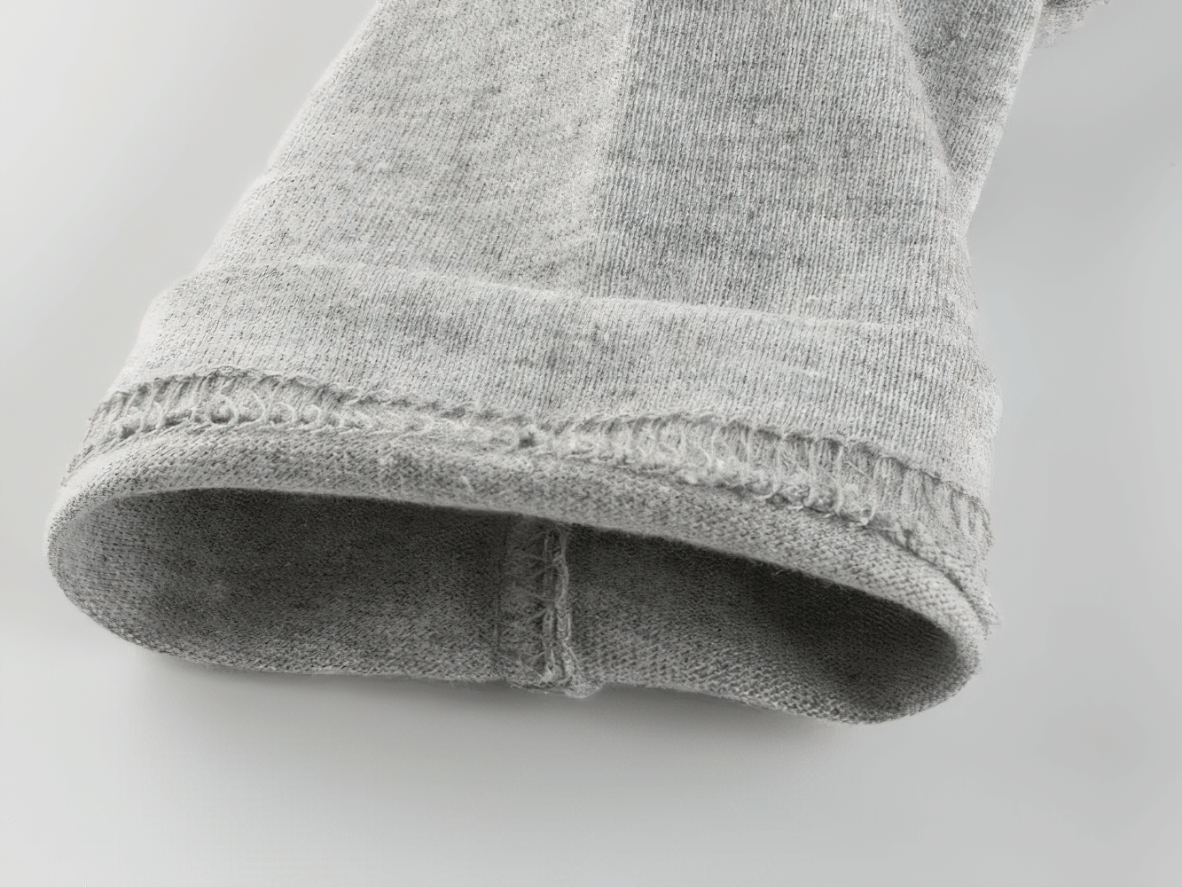 Close-up of sleeve hem detail on Boys Cotton Long-Sleeved Top with Letter Print - SF3608, showcasing durable stitching and soft fabric.