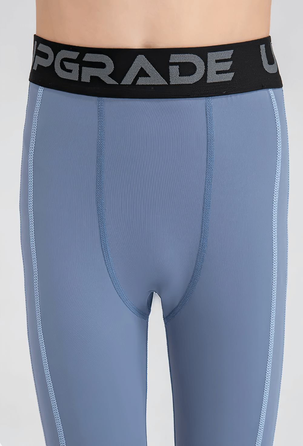 Close-up of Boys Elastic High-Waisted Fitness Leggings - SF3780 with black waistband and blue fabric.