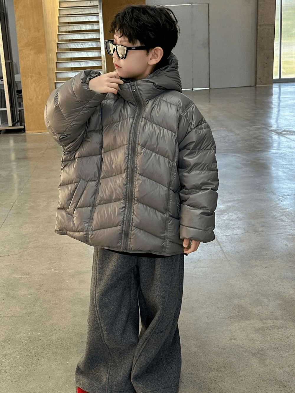 Child wearing Boys Hooded Down Puffer Jacket With Zipper - SF3638, showcasing warm and comfortable winter outfit indoors.