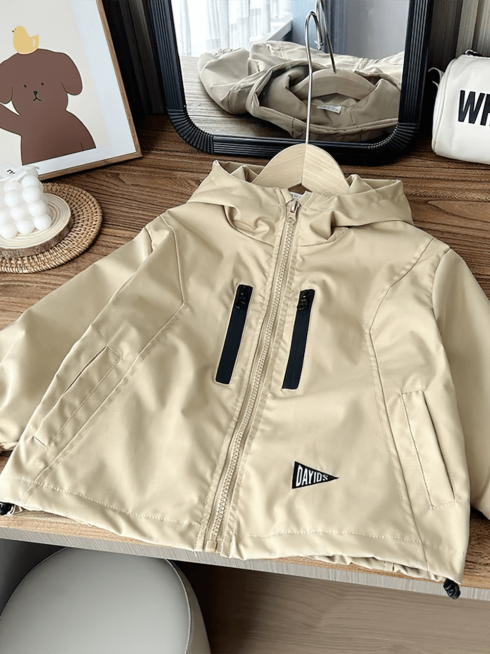 Boys Hooded Zipper Windbreaker Jacket - SF3565 in beige on wooden table, showcasing stylish outdoor wear for kids.