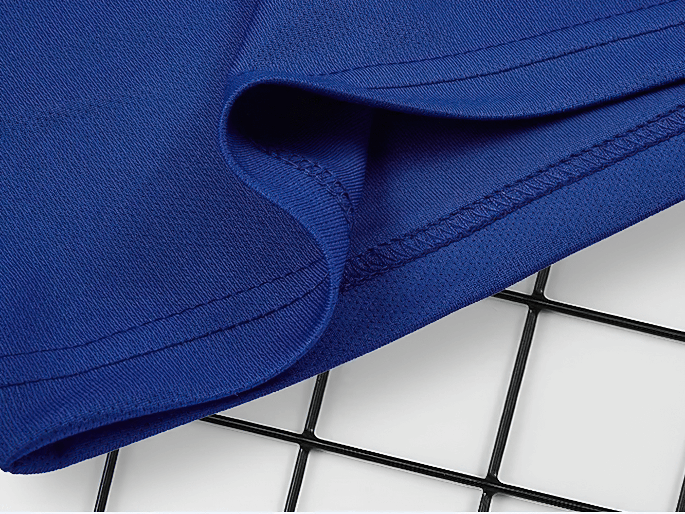 Close-up of blue fabric detail on Boys Quick-Dry Long-Sleeved Sports Top for Running - SF3601, showcasing breathable material and stitching.