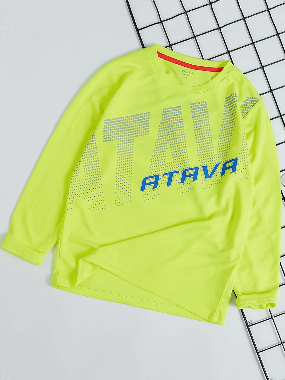 Bright yellow Boys Quick-Dry Long-Sleeved Sports Top for Running - SF3601 with bold graphic design on a grid background.