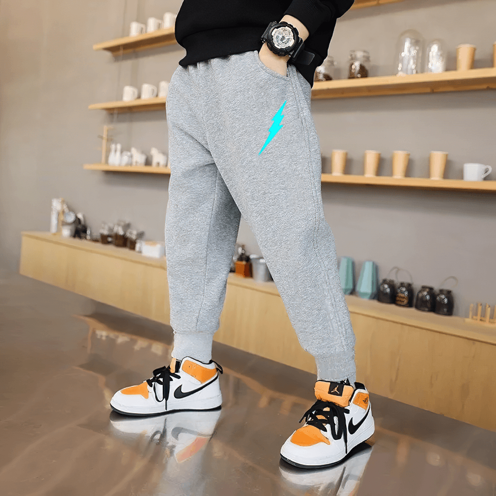 Boys Sporty Jogger Pants with Luminous Prints - SF3724, featuring elastic waist, practical pockets, and luminous lightning design.