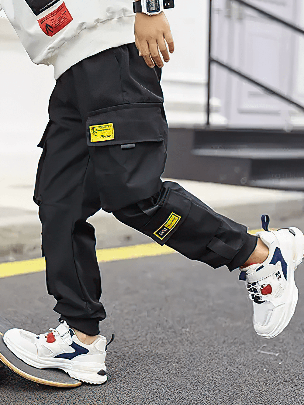 Boys Stylish Sport Cargo Jogger Pants - SF3868 in urban play setting with elastic waist and flap pockets, paired with sneakers.