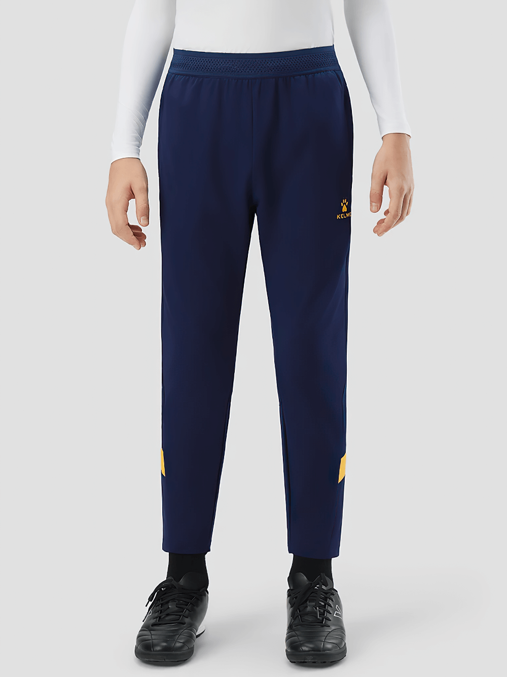 Boy wearing Boys Thermal Training Pants with Elastic Waist - SF3662, perfect for sports and casual wear.
