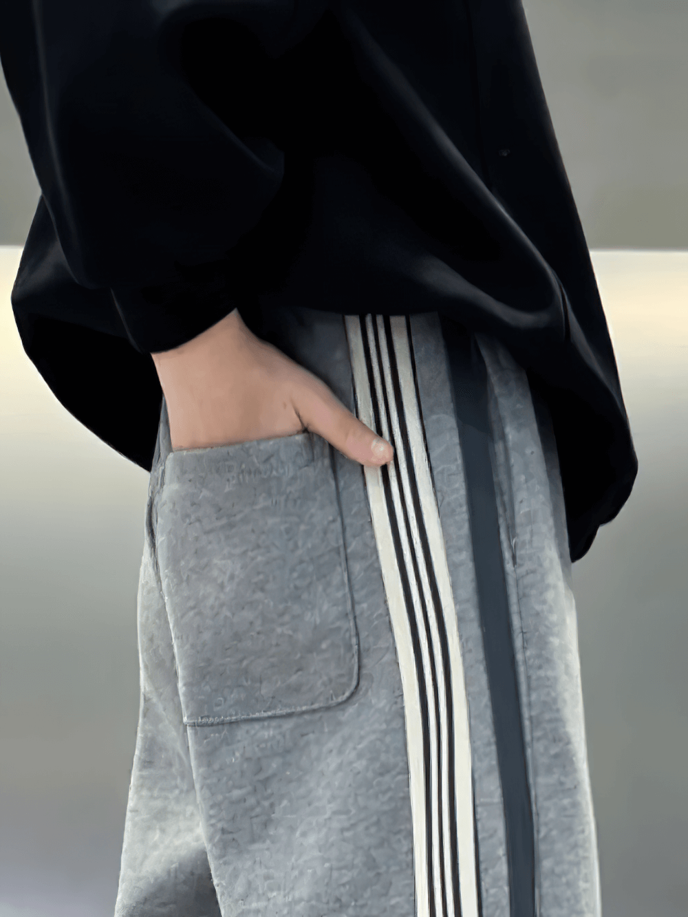 Close-up of Boys Trendy Sport Pants with Stripes - SF3705, showcasing wide-leg design with breathable fabric and stylish stripes.