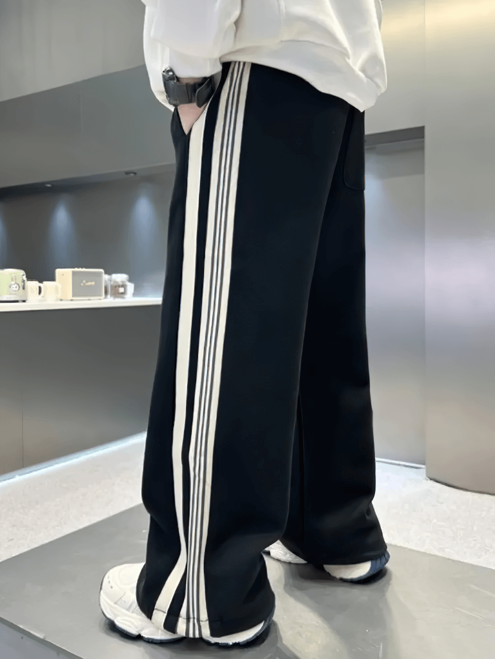 Close-up of Boys Trendy Sport Pants with Stripes - SF3705, featuring wide-leg design and breathable fabric.