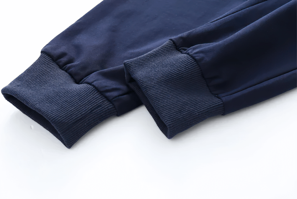 Close-up of Boys Warm Jogger Sweatpants with Elastic Waist - SF3693 showing ribbed cuffs in dark blue color.