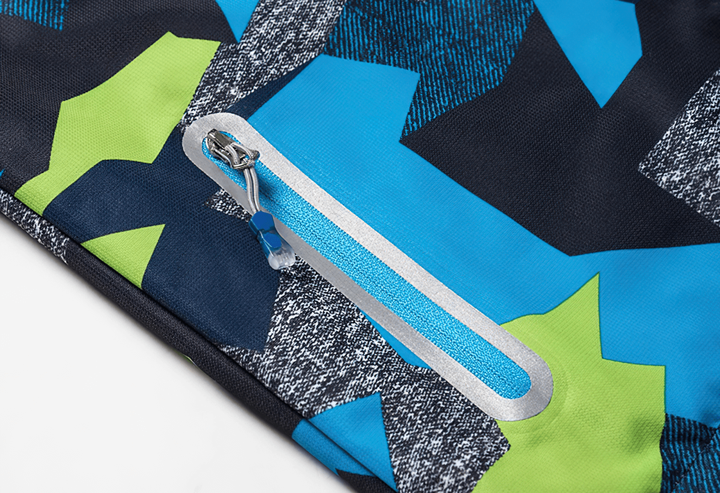 Boys Waterproof Hooded Outdoor Sport Jacket - SF3600 featuring stylish bold geometric print and secure zippered pocket detail.