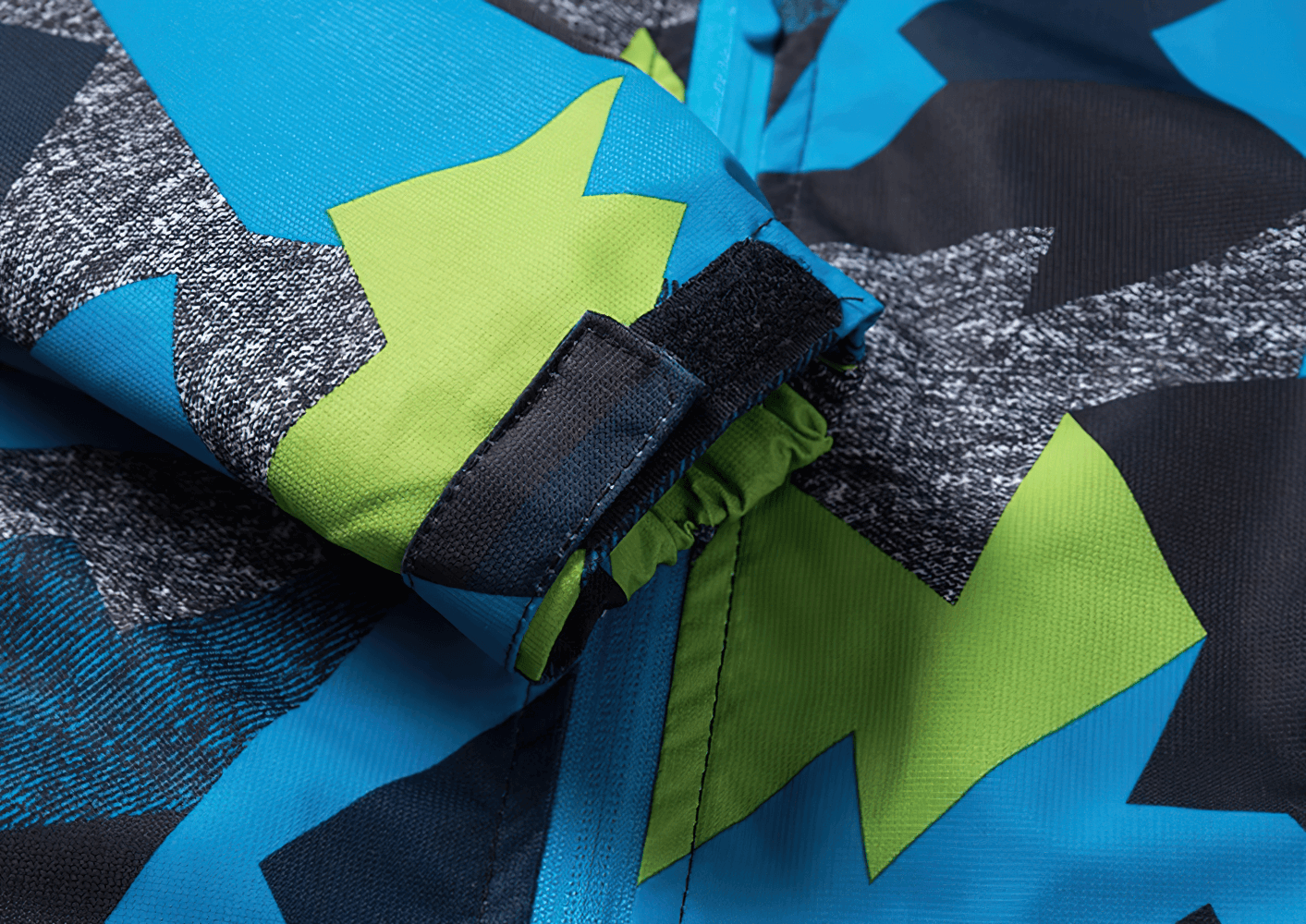 Close-up of the bold geometric print on the Boys Waterproof Hooded Outdoor Sport Jacket - SF3600