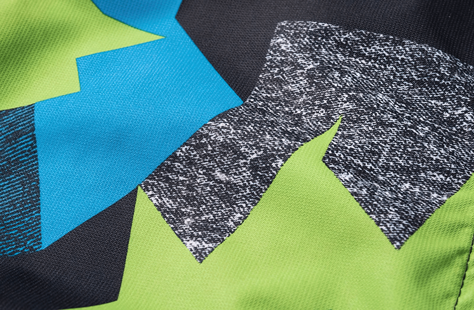 Close-up of bold geometric print on Boys Waterproof Hooded Outdoor Sport Jacket - SF3600.