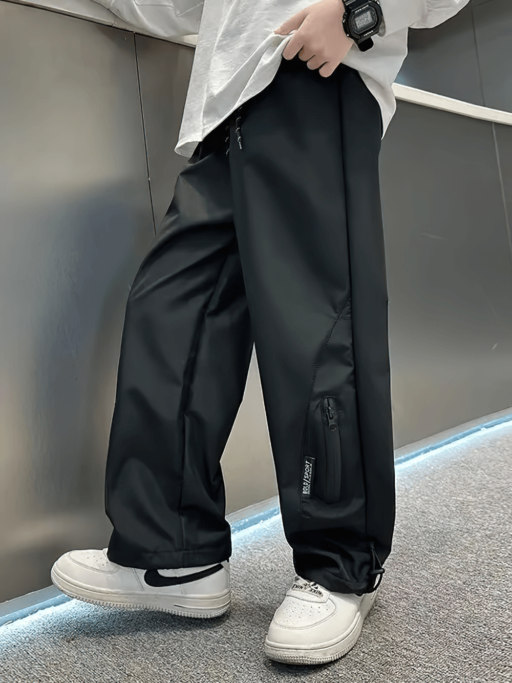 Boy wearing Boys Wide-Leg Streetwear Pants with Pockets - SF3706, showing off casual style with white sneakers and a watch.