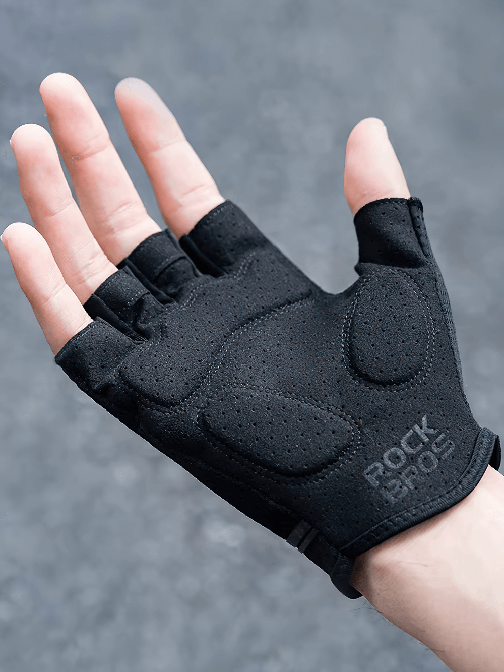 Breathable anti-shock half-finger cycling gloves with SBR palm pads for superior grip and durability, ideal for outdoor adventures.