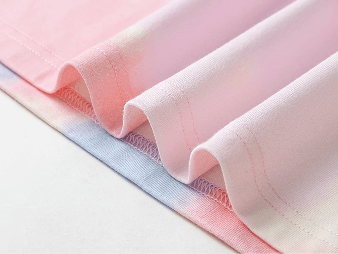 Close-up of the Breathable Cotton Tie-Dye Tee for Boys and Girls - SF3683 showcasing detailed fabric texture in pastel hues.